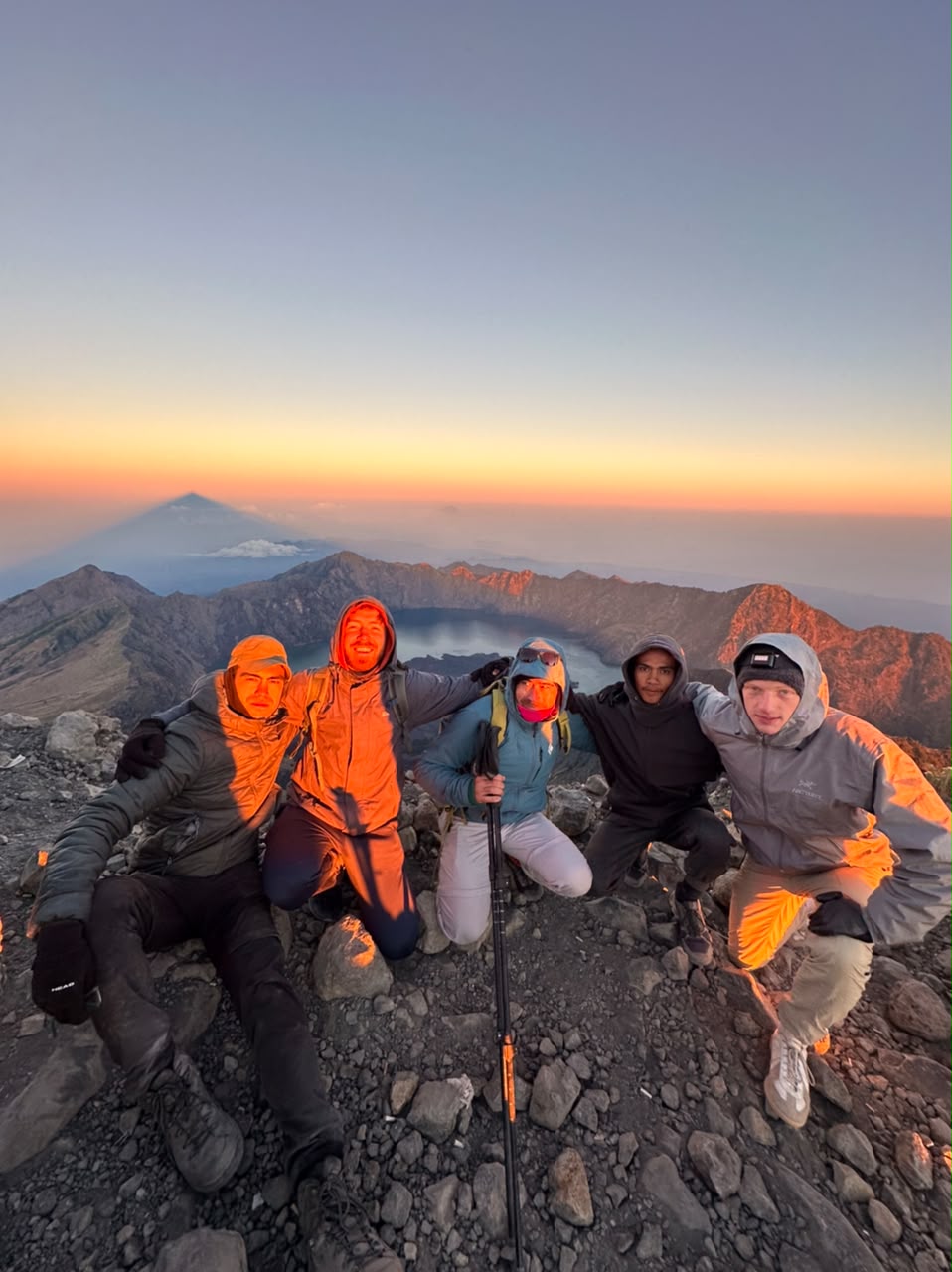 Sunrise above the clouds at Mount Rinjani summit
